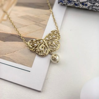 Dior Butterfly Pearl Charm Gold Chain Bracelet