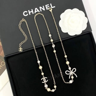 Chanel Elegant Ribbon Pearl Charm Necklace