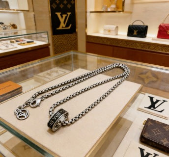 Louis Vuitton Monogram Orbit Barrel Pendant Necklace